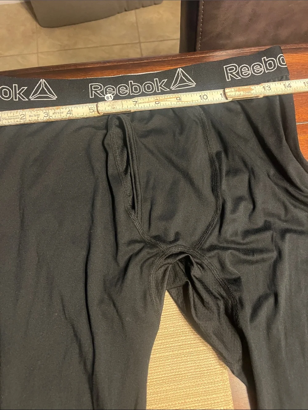Item 81’.  Reebok Black Men's Compression Base Layer Tights long John’s large